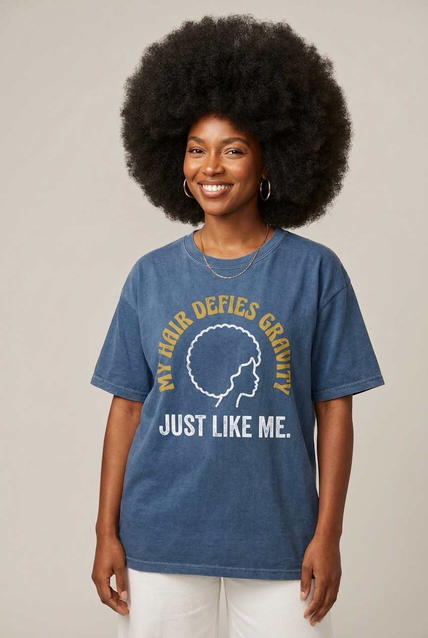 My Hair Defies Gravity Just Like Me: Black Girl Magic Afro Graphic T-Shirt - RootednLoud