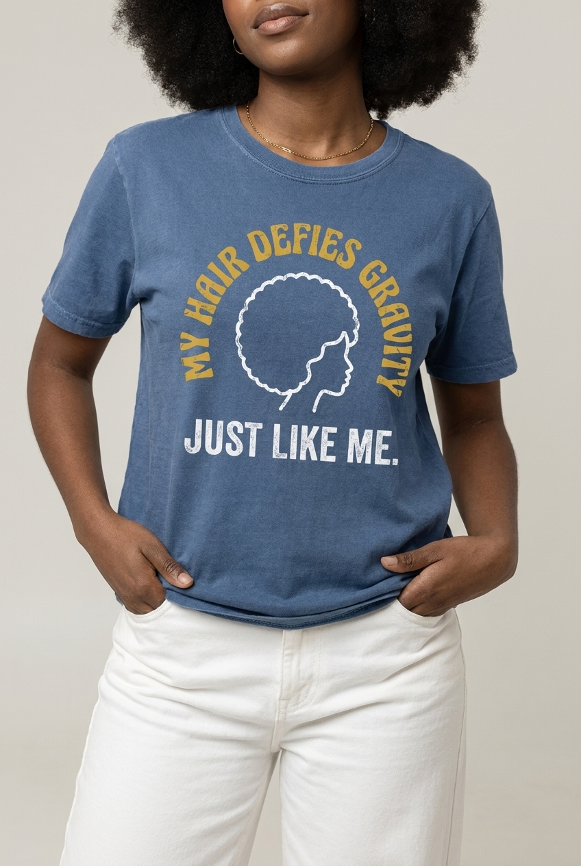 My Hair Defies Gravity Just Like Me: Black Girl Magic Afro Graphic T-Shirt - RootednLoud